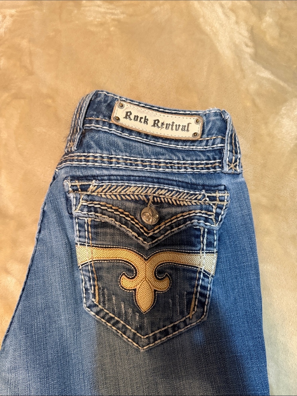 Rock Revival Women's Blue Jeans with Gold Embroidered Pocket
